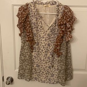 Mixed pattern blouse size L